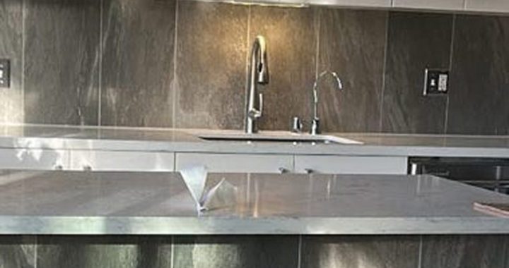 Kitchen tile installation featuring custom backsplash and tile flooring