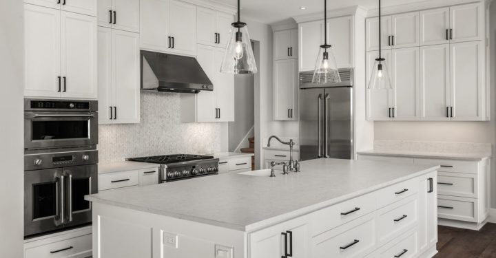 Fine Set Tile kitchen remodel with custom tile design and finished cabinetry